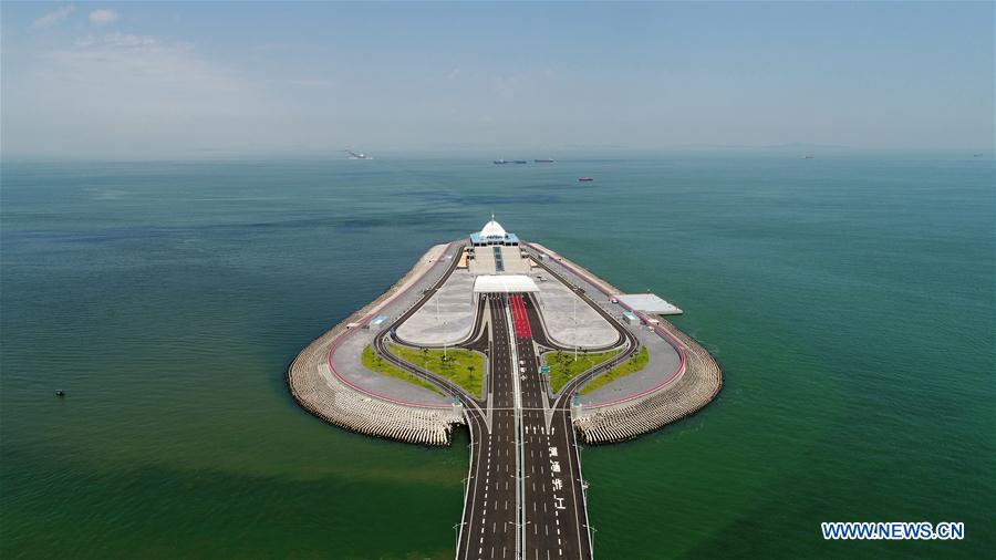 Xinhua Headlines: World's longest cross-sea bridge opens, integrating China's Greater Bay Area