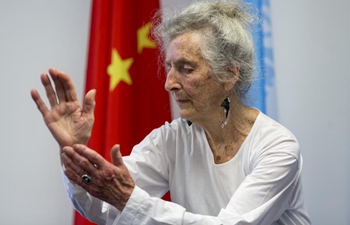 Feature: Tai Chi Chuan brings "balanced" life to 93-year-old woman in U.S.